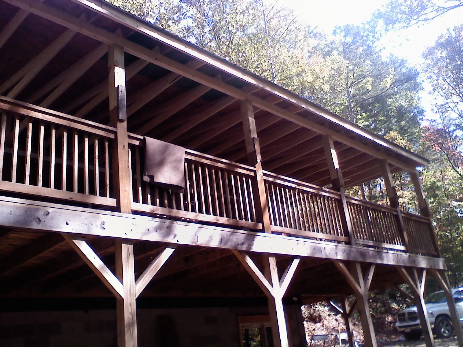 Timber framing under a new elevated porch and deck — Roof Leak Repair in Winston-Salem by Roofing Brothers